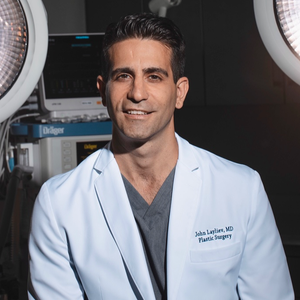 blured John Layliev, MD