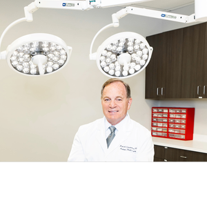 blured Mark A. Schusterman, MD, FACS