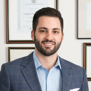 blured James M. Economides, MD, FACS