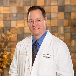 blured Christopher G. Williams, MD