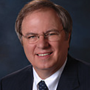 blured John L. Millns, MD