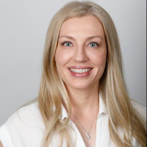 blured Astrid McLean, MD - Account Suspended