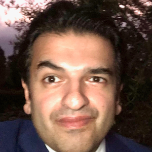 blured Ajay Desai, DO