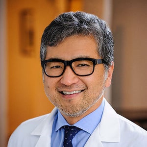 blured Tae Ho Kim, MD