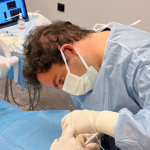 blured Caglar Korcuk, DDS, PhD