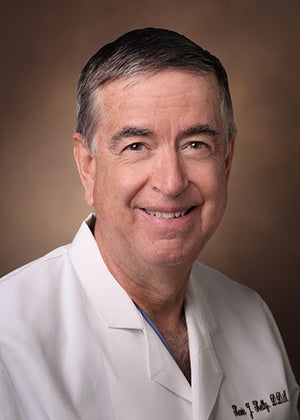 Kevin J. Kelly, MD, DDS