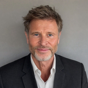 blured Dr. Mike Comins, MBBS profile photo