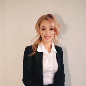 blured Ruth Swissa, CMM