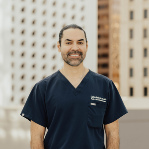 blured Carlos Mata MD, MBA, FACS