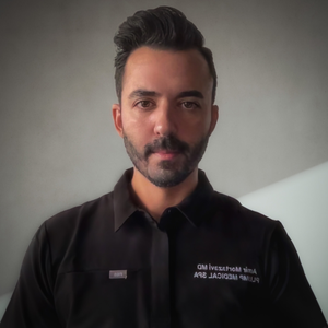 blured Amir Mortazavi, MD