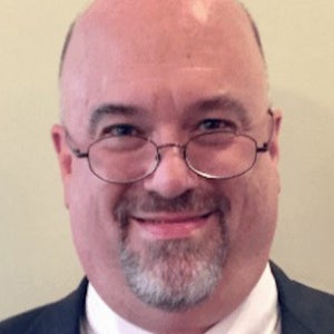 blured John R. Fleming, Jr., MD