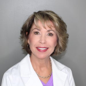 blured Kimberly Vaughn, Tricologist, WTS, USTI