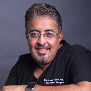 blured Santdeep Paun, MBBS, FRCS