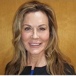 blured Meg Brewster - Medical Esthetician, CME