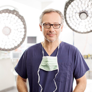 blured Michael Zacharia, MBBS, FRACS, FAAFPS - Suspended