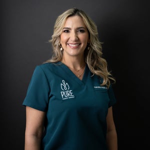 blured Natalia Vidal Laureano, MD, FACS