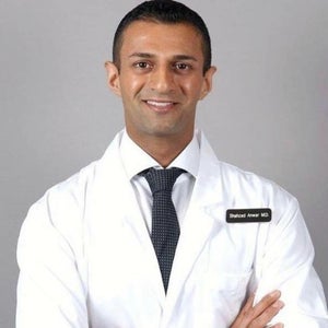 blured Shahzad Anwar, MD