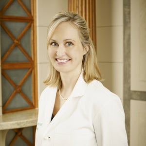 blured Ashley R. Curtis, MD