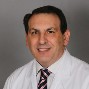 John L. Roussalis, MD