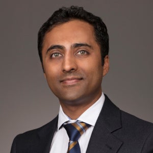 Niro Sivathasan, MBBS, MRCS, FAACS