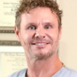 blured Edmond Wood, MD - Account Suspended