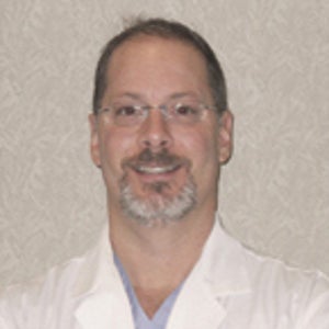 blured Eric S. Mager, MD