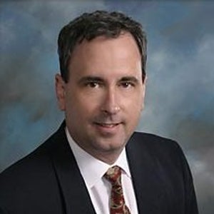 James E. White, MD