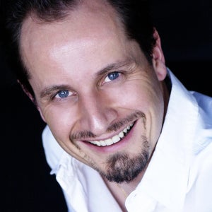 blured Christopher (Chris) Leat, MBChB