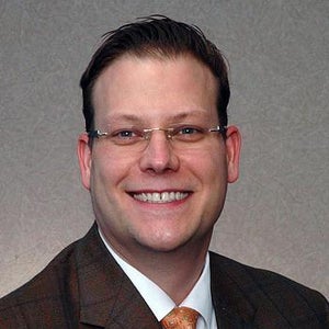 blured Mark E. Mathieson, MD