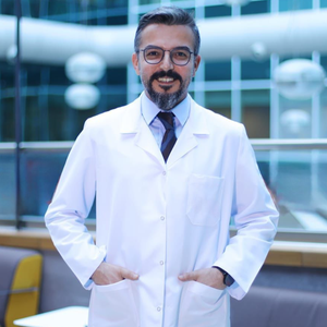 blured Mustafa Atabey, MD