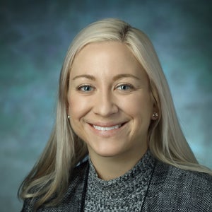Carrie Houssock, MD