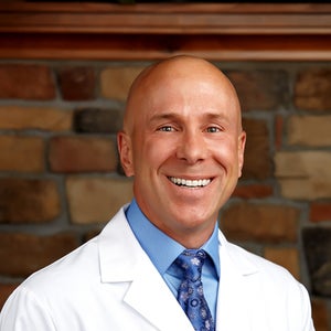 blured Ralph R. Reynolds, DMD, MD