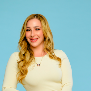 blured Janelle Vega, MD