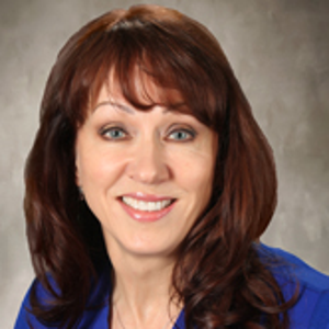 blured Sylvia Mills, LPN, Medical Aesthetician