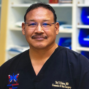 blured Ted Y. Fisher, MD - Account Suspended