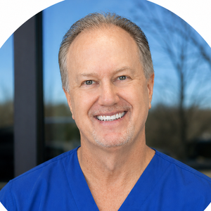 blured Chris L. Tye, MD, DDS