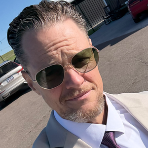 blured Neil McMullin, MD