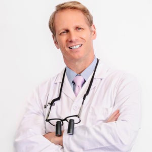 blured John E. Frank, MD