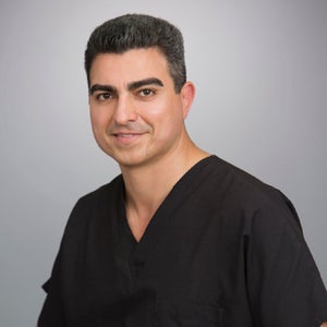 blured Matt Tahsini, MD