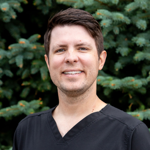 blured John Muzic, MD