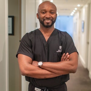 blured Gordon Andan, MD