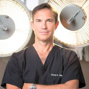 blured David P. Rapaport, MD, FACS