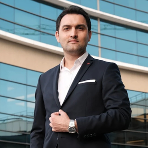 blured Ali Alaiye, MD