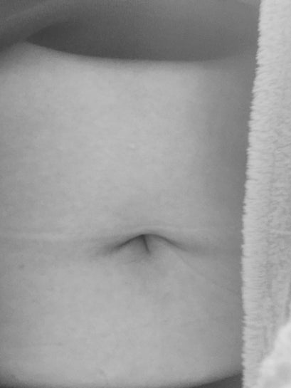 frowning belly button