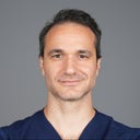 blured Mehmet Comert, MD