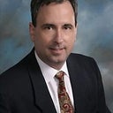 James E. White, MD