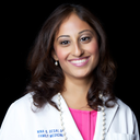 blured Nina G. Desai, DO