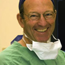 blured Tony Holmes, MBBS, FRACS