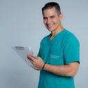 blured Carlos Alberto Ríos García, MD